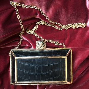BCBGMaxAzria black and gold tiger clutch